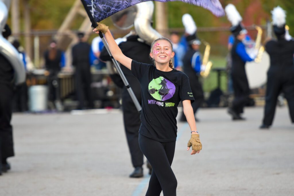 Color guard student with flag