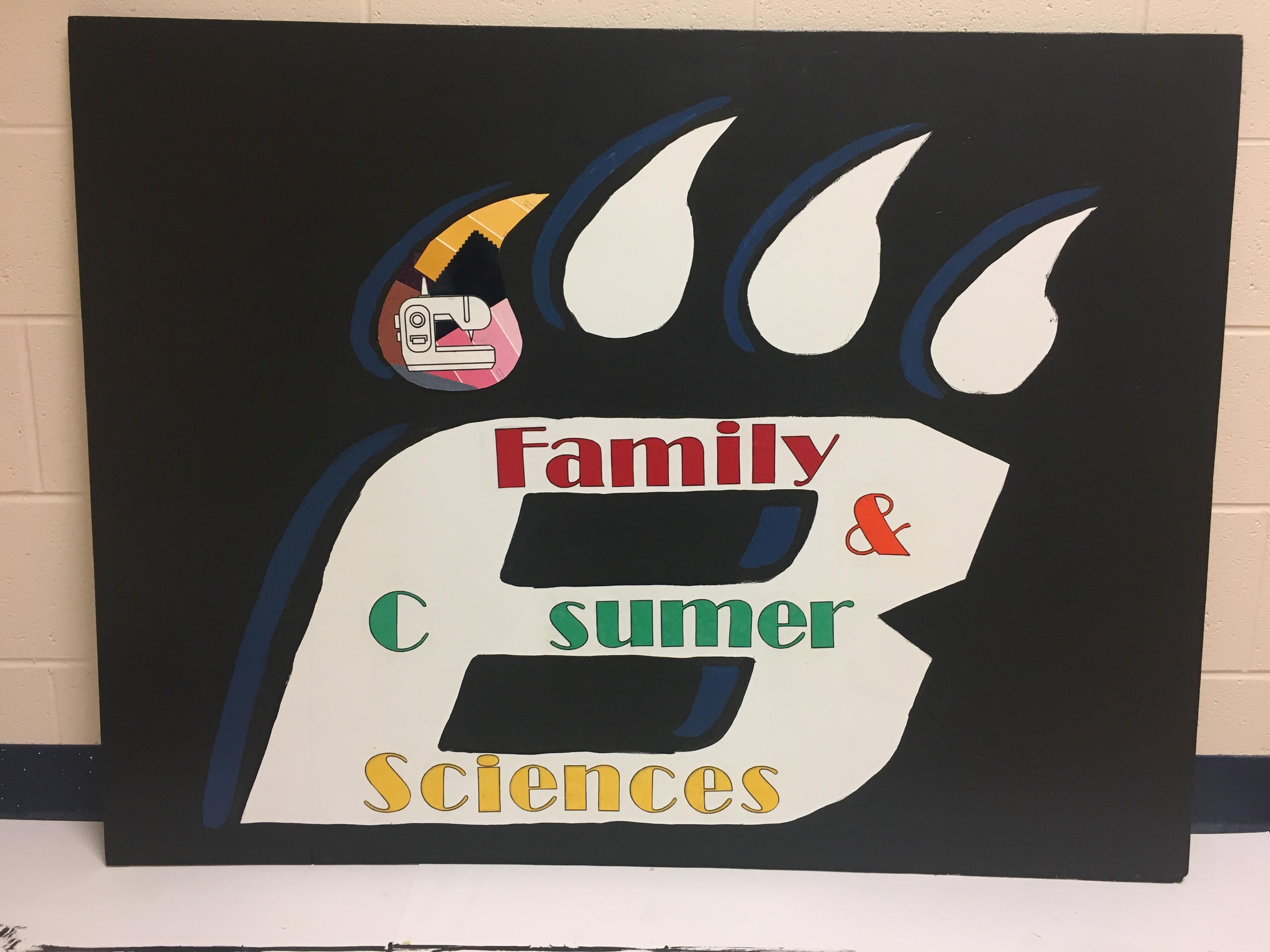 Family & Consumer Sciences--each claw will show a different aspect of FCS classes. The first is sewing. Finances, child rearing and cooking will be added in a similar collaged way.