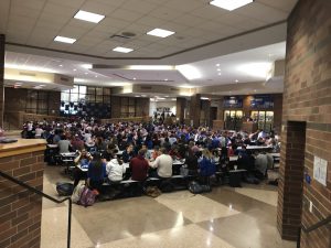 Students are on their phones during lunch instead of talking to one another. Photo taken by Jayla Shanmugam (11).