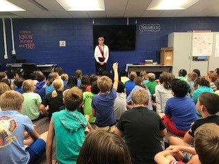Mary in front of students
