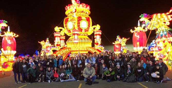 students posing at the festival