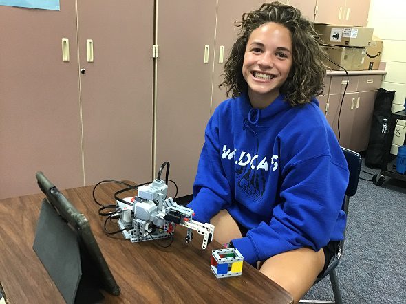students working on robot