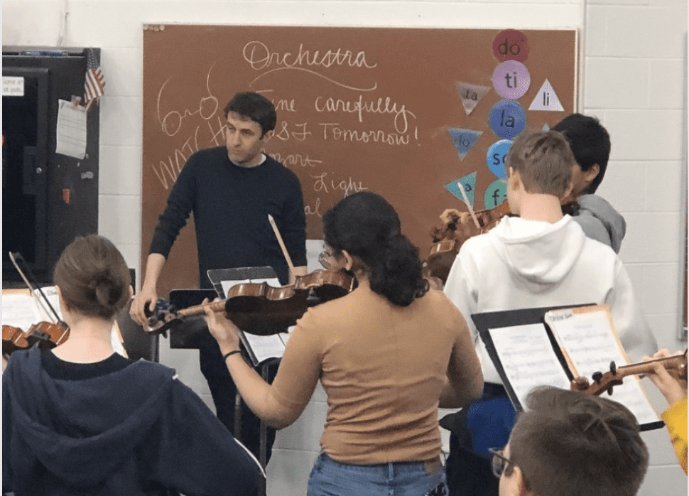 Renown Violinist at Davidson Orchestra Rehearsal